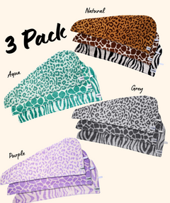 Set of 3 - 100% Cotton Turbie Twist Hair Towels in Safari Prints - Leopard, Zebra & Giraffe in Natural colors, shades of aqua, shades of grey & shades of purple.