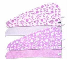 Set of 4 100% Cotton Turbie Twists in the colors White, Purple, Purple with a White Floral Print, and White with a Purple Flower Prints.