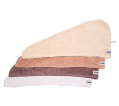 100% Cotton Turbie Twists in the Colors White, Oatmeal, Deep Sand, and Ash.